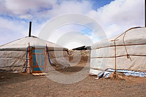Gers, Mongolian tent or yurts close to Tsagaan Suvraga Â«Â white stupaÂ Â» area, in the Gobi desert, Dundgovi Province, Mongolia.